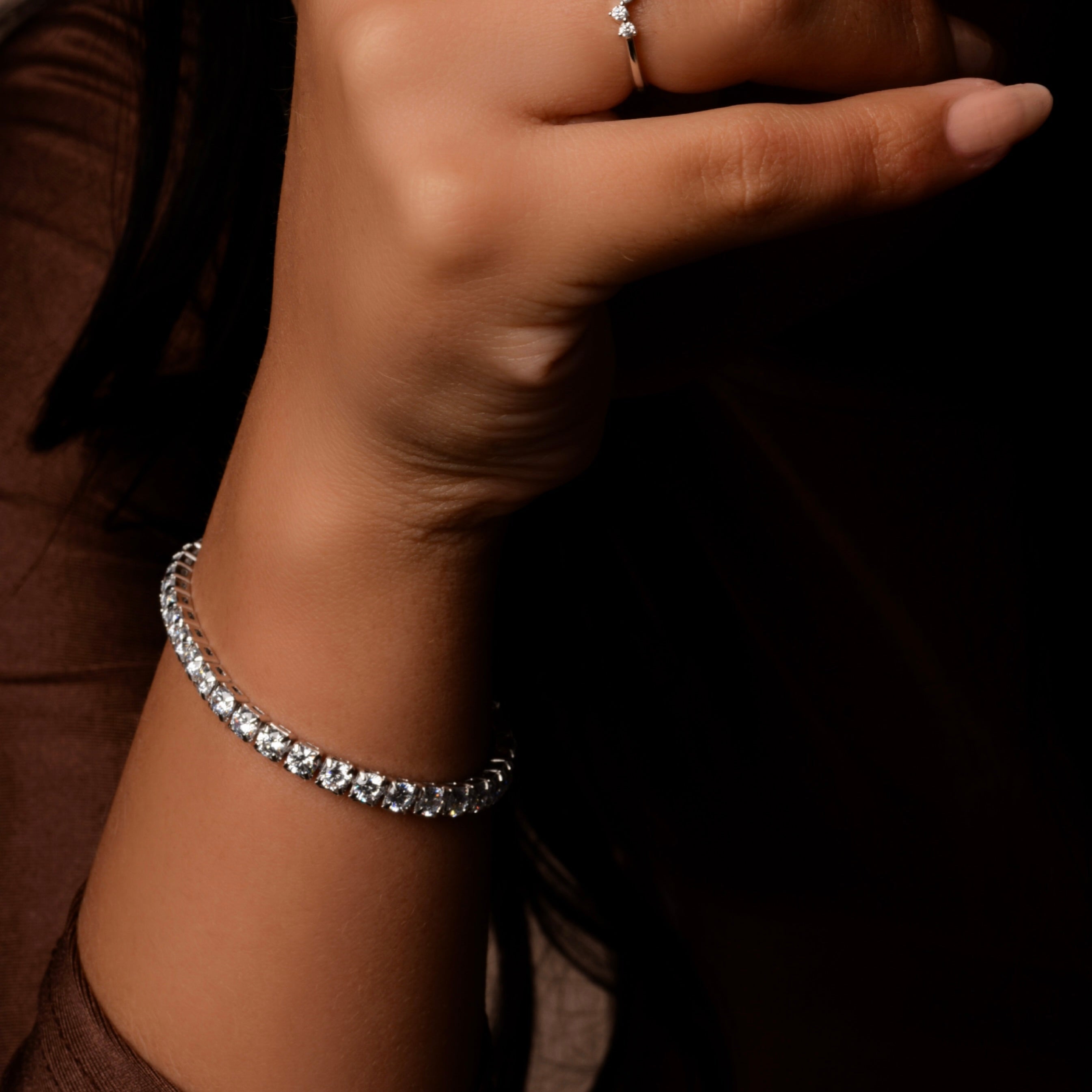 Tennis chain bracelet crafted in sterling silver plated with 18k white gold with rhodium, front side, stone size 3mm