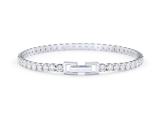 Cut Ice shaped simulated diamond tennis chain bracelet in white stone, crafted in sterling silver plated with 18k white gold with rhodium, front side, main stone size 3mm
