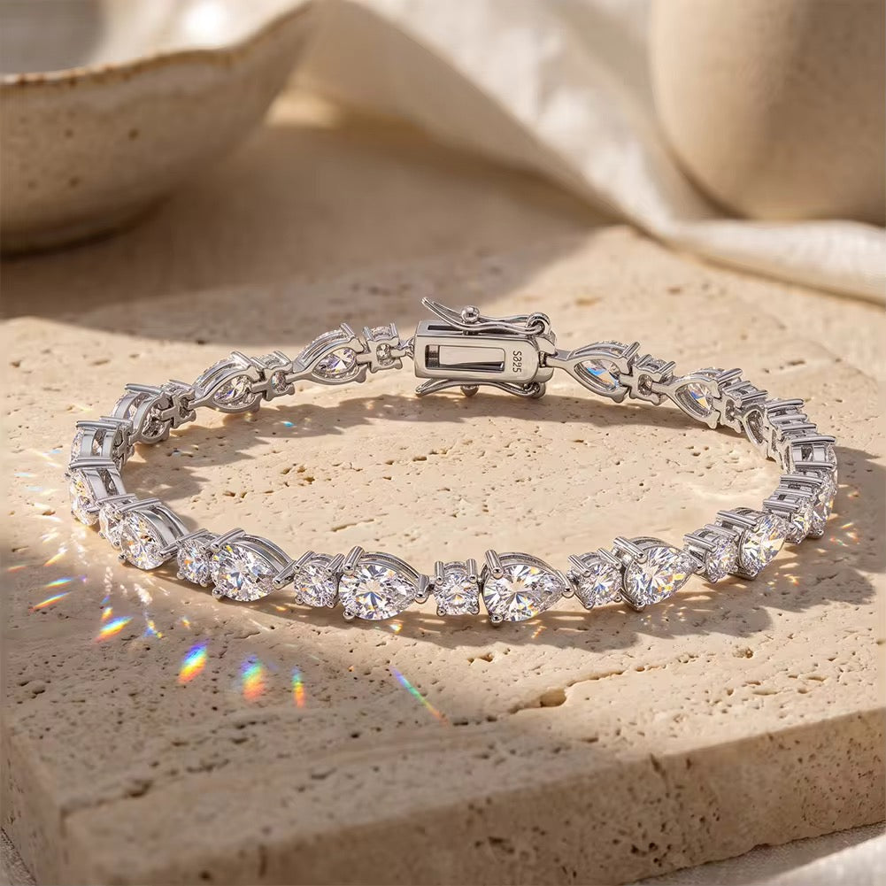 LOTUS 0.5ct Pear Cut + 0.03ct Round Cut Moissanite Bracelet in Sterling Silver - 7 inches