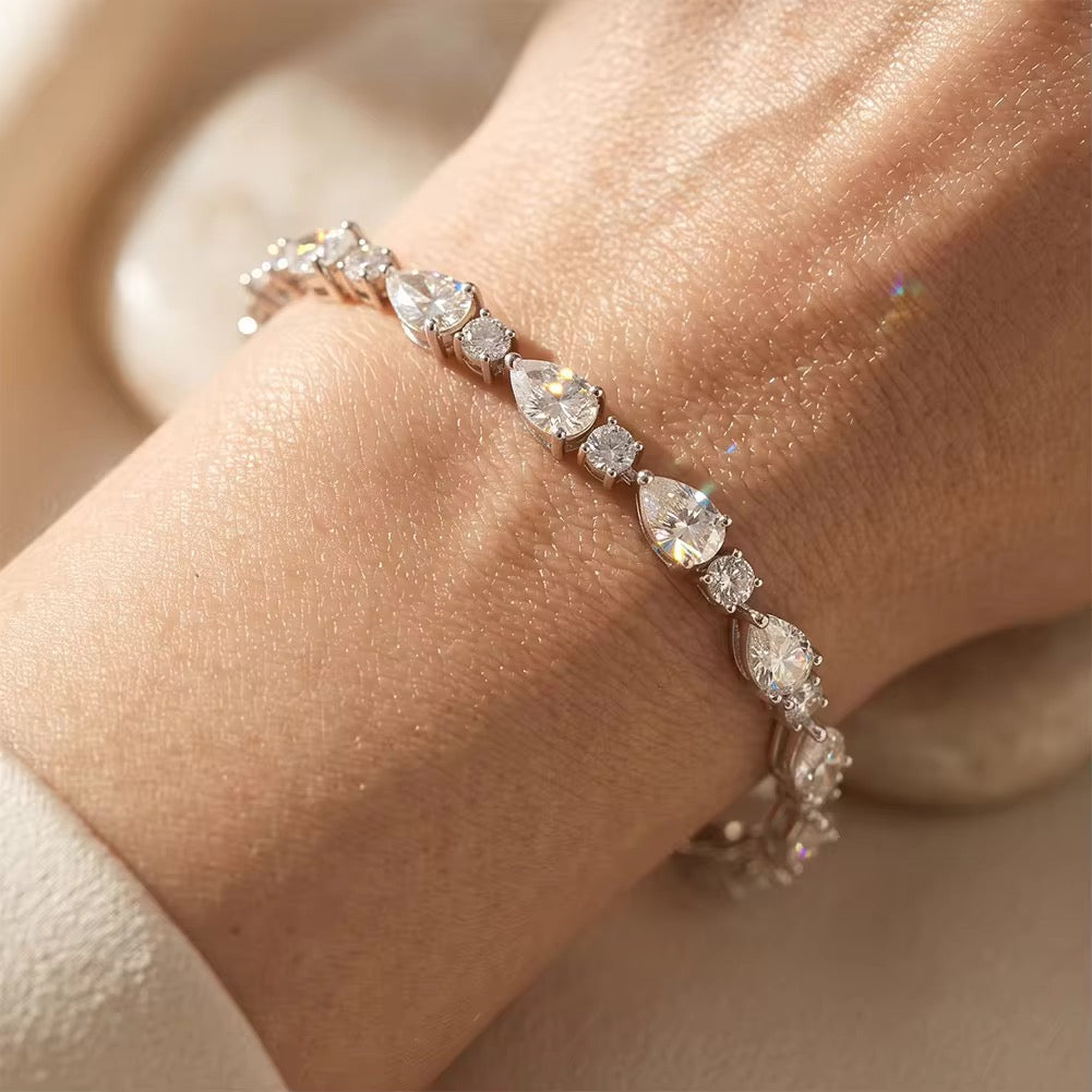 LOTUS 0.5ct Pear Cut + 0.03ct Round Cut Moissanite Bracelet in Sterling Silver - 7 inches