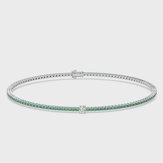 Cut Ice shaped simulated diamond tennis chain bracelet in green stone, crafted in sterling silver plated with 18k white gold with rhodium, 3D video animation of all bracelet details, main stone size 2mm